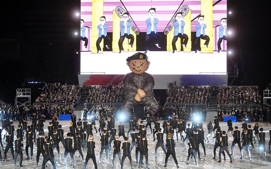Psy sings 2012 megahit "Gangnam Style" during the 70th Armed Forces Day in Seoul, South Korea, Monday, Oct. 1, 2018.