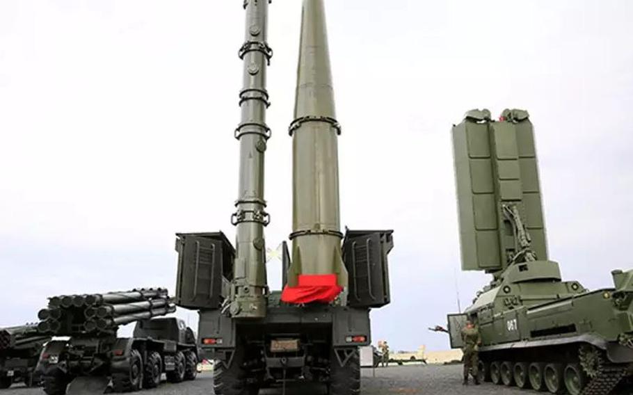 Russian 9M728 cruise missiles, left, and 9M723 short-range ballistic missiles, right. The U.S. says Russia's new 9M729 ground-launched missile violates the INF's ban on all ground-launched intermediate-range cruise and ballistic missiles.