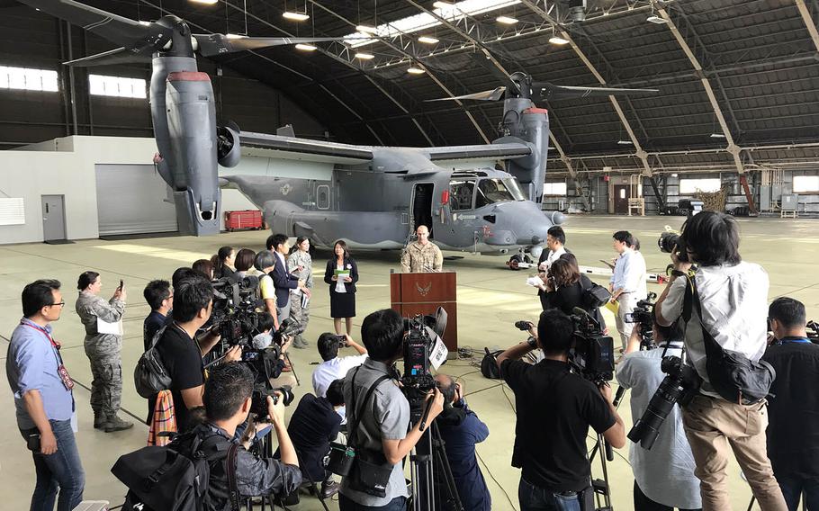 Air Force Maj. Buckley Kozlowski, commander of Detachment 1, 353rd Special Operations Group, speaks to Japanese reporters about the CV-22 Osprey at Yokota Air Base, Japan, Wednesday, Oct. 3, 2018.