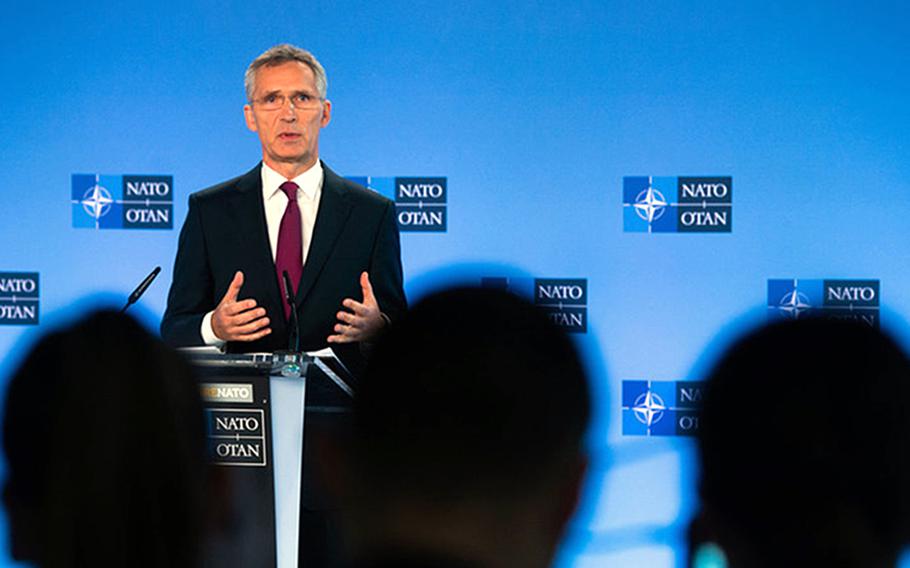 NATO Secretary-General Jens Stoltenberg talks to reporters at NATO headquarters in Brussels, Belgium, Wednesday, Oct. 3, 2018. He said he expects more nations to offer up national cyber capabilities when needed to bolster NATO defenses.
