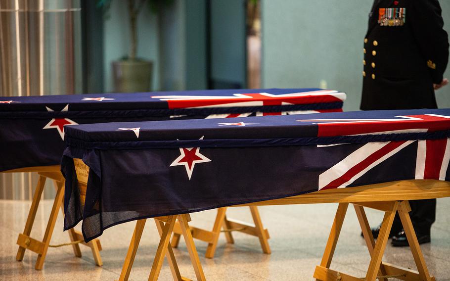 A pair of caskets belonging to New Zealand servicemembers who died after the Korean War are seen at Osan Air Base, South Korea, Friday, Oct. 5, 2018.
