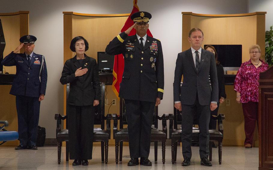 Foreground, from left: Pi Woo-jin, South Korean minister of Patriot and Veteran Affairs; Gen. Vincent Brooks, U.S. Forces Korea commander; and Philip Turner, New Zealand ambassador to South Korea, attend a repatriation ceremony at Osan Air Base, South Korea, Friday, Oct. 5, 2018. Marcus Fichtl/Stars and Stripes