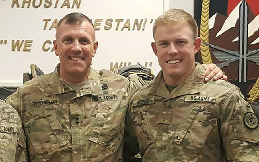 Zachary Woods, right, then a second lieutenant, is pictured at Bagram Air Field in this Army photo from September 2016 with 1st Cavalry Division commander Maj. Gen. John ''J.T.'' Thomson in the days after Thomson took command of the U.S. base about 40 miles north of Kabul, Afghanistan. Woods was shot in the chest a few months later during a conversation in which he and a Marine veteran were talking about their firearms skills. 

