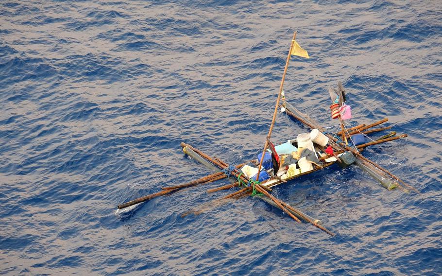 A makeshift boat filled with minimal supplies is adrift in the South China Sea, Monday, Oct. 8, 2018. Five Philippine fishermen survived for five days aboard the craft after their boat sank at sea. They were rescued by the crew of USNS Wally Schirra.