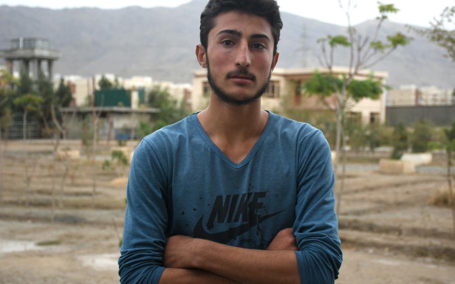 Saifurahman Paimani, 16, from Maidan Wardak province, stands outside his room at the Kabul orphanage he lives in, on Monday, Oct. 8, 2018. Paimani says two of his sisters were killed in September by a U.S. airstrike on his family's home.