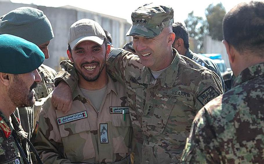 Then-Maj. Gen. Abdul Raziq, left, police chief of Kandahar province, meets Army Lt. Gen. Joseph Anderson, at the Joint Regional Afghan National Police Center in 2014. Raziq was shot and killed Oct. 18, 2018 at the Kandahar governor's residence, shortly after U.S. Gen. Scott Miller and other U.S. servicemembers were there. The Taliban claimed responsibility for the killing.