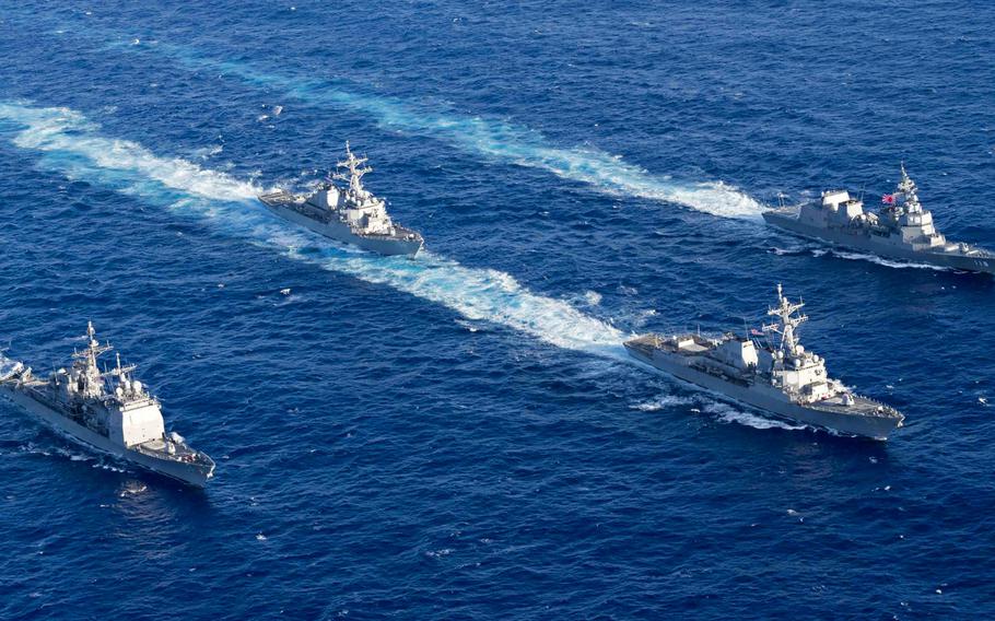 The guided-missile destroyer USS Mustin leads the guided-missile cruiser USS Antietam, the USS Curtis Wilbur and the Japan Maritime Self-Defense Force ship JS Fuyuzuki during the MultiSail exercise, March 14, 2018.