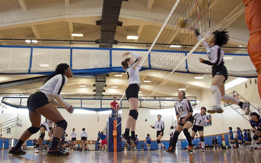 Volleyball players from Japanese and Department of Defense Education Activity high schools compete at Kadena Air Base, Okinawa, Saturday, Oct. 20, 2018.
