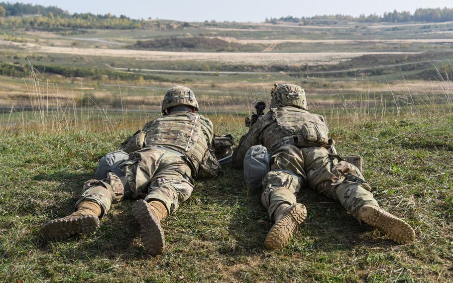 U.S. soldiers assigned to 2nd Cavalry Regiment scan the range during a live-fire exercise as part of Dragoon Ready at the 7th Army Training Command's Grafenwoehr training area, Germany, Oct. 17, 2018.
