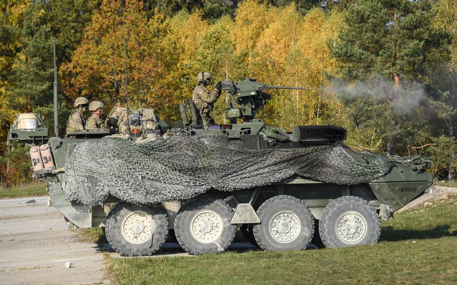 U.S. soldiers assigned to 2nd Cavalry Regiment fire an M2 .50-caliber machine gun during exercise Dragoon Ready at the 7th Army Training Command's Grafenwoehr training area, Germany, Oct. 17, 2018.