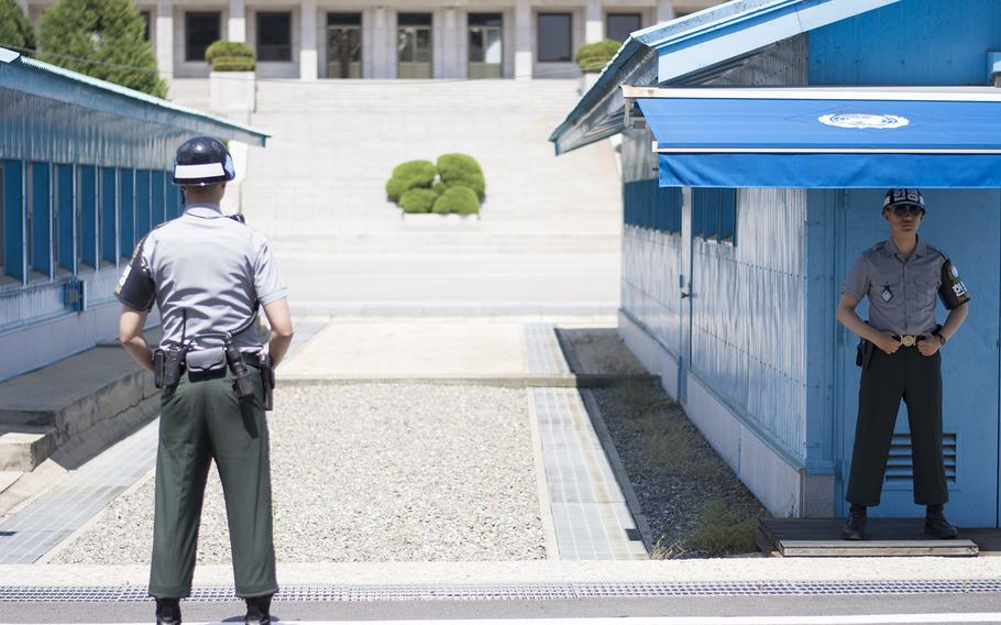 South Korean soldiers stand guard at the Joint Security Area on the border of the two Koreas, May 24, 2017.