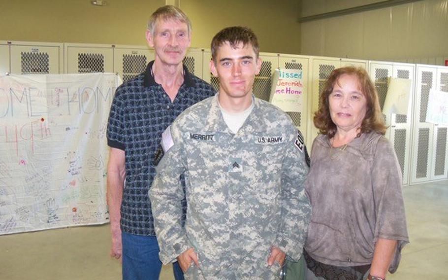 Steve and Carol Merritt stand with their son, Aaron after he returned from a deployment to Afghanistan. In 2014, Staff Sgt. Aaron Merritt died in a VA hospital. The VA settled a lawsuit in connection with his death for $2.5 million.