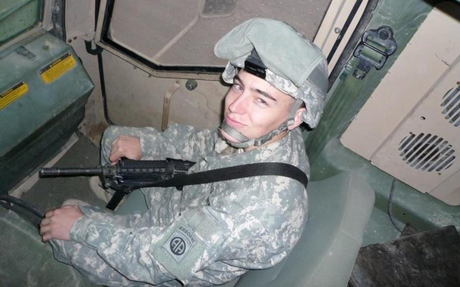 U.S. Army Staff Sgt. Aaron Merritt sits in a armored vehicle in Iraq. Merritt did one tour in Iraq, and two in Afghanistan. He later died in 2014 while being treated for colitis at a VA hospital. The VA recently agreed to a $2.5 million settlement with his parents in connection with his death.