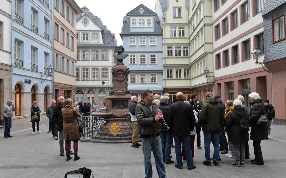 The Huehnermarkt or Chicken Market is the center of the new Old Town construction in downtown Frankfurt, Germany. The bust at center is of Friedrich Stoltze, a Frankfurt writer and poet.
