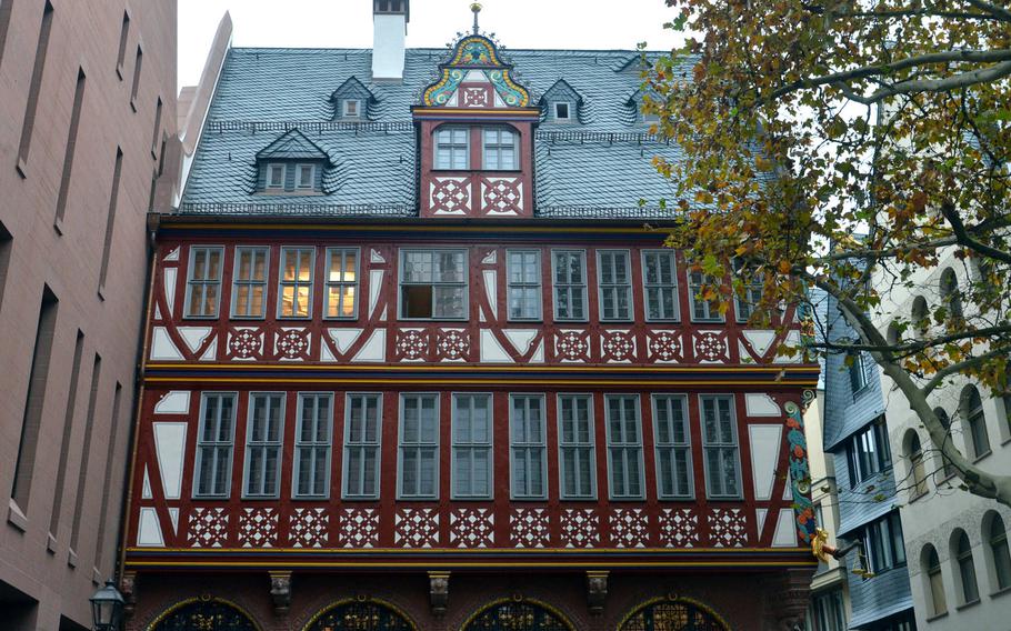 The Goldene Waage or Golden Scale was a renaissance half-timbered house before being destroyed in World War II. This is its reconstruction in Frankfurt's new Old Town.
