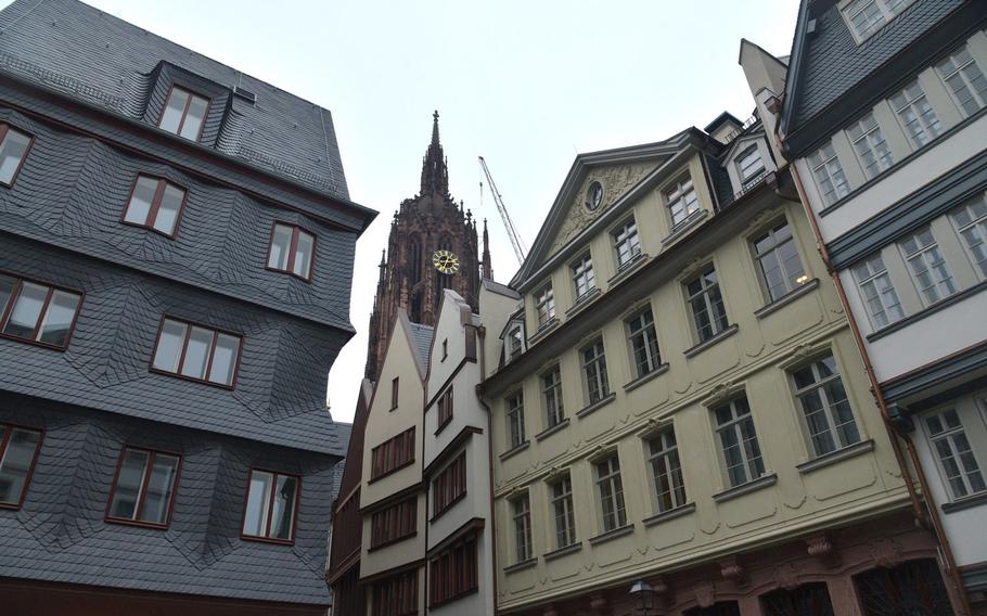 The Frankfurt Dom, or cathedral, rises above the newly constructed buildings that make up the city's new Old Town. Destroyed in World War II, the area has been rebuilt with 35 new buildings, 15 of them reconstructed to original plans.