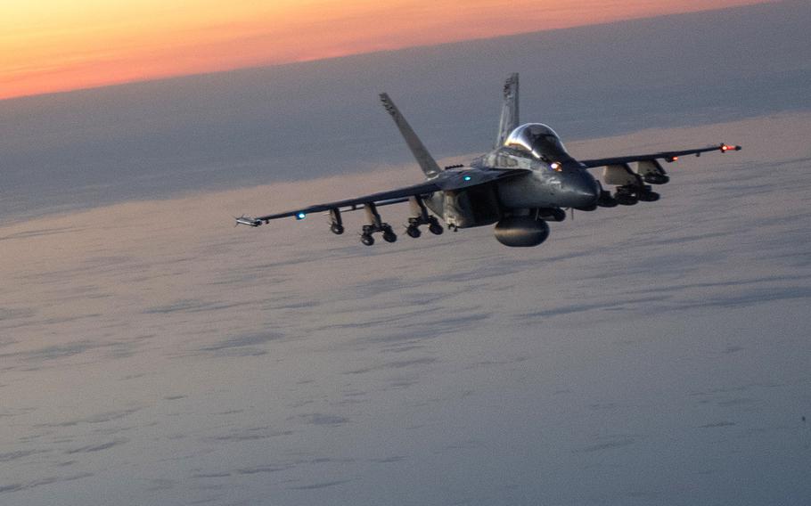 A U.S. Navy F/A-18E/F Super Hornet flies over Afghanistan in December 2017. The U.S. dropped more bombs and other munitions in Afghanistan during the first ten months 2018 than in any other full year since at least 2006, when documentation began.