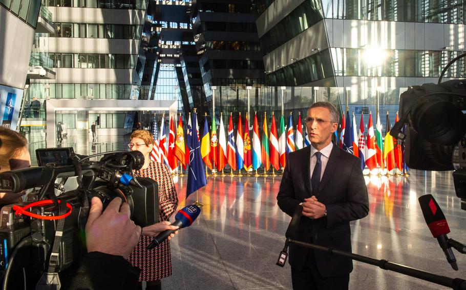 NATO Secretary-General Jens Stoltenberg talks to the media before the start of the NATO foreign ministerial meetings at the organization's headquarters in Brussels, Belgium, Tuesday, Dec. 4, 2018.