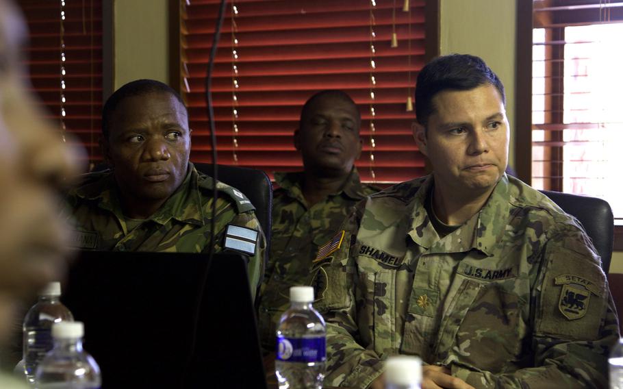 Maj. Teremuura Shamel, the U.S. Army Africa African Land Forces Summit lead planner, and Lt. Col. BC Phejana, the Botswana Ground Forces Command ALFS lead planner, brief the Botswana GFC commander Oct. 26, 2018, in Gaborone, Botswana.