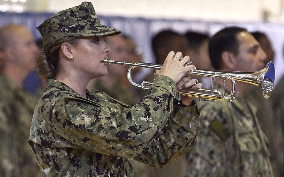 Petty Officer 2nd Class Kristen Gale plays taps during a memorial service for Vice Adm. Scott Stearney on Naval Support Activity Bahrain, Wednesday, Dec. 5, 2018. Stearney, who led U.S. Naval Forces Central Command and the 5th Fleet, was found dead at his Bahrain home Dec. 1.