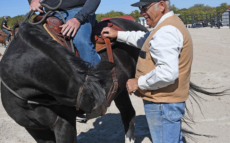 War Horses for Veterans mentor Gary Llewellyn works with a combat veteran on how to perform a one-rein stop. 