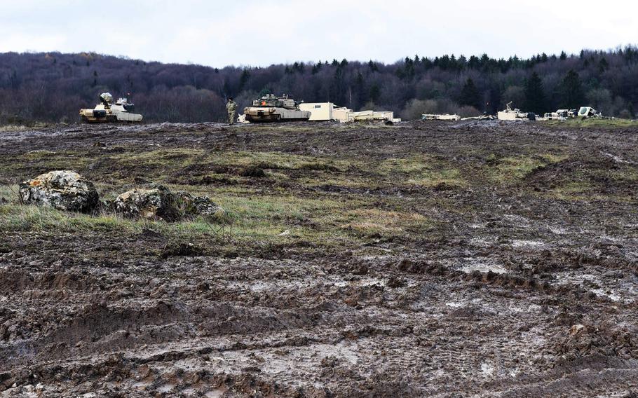 A M1A2 Abrams tanks with the 1st Cavalry Division's 1st Armored Brigade Combat Team operates on a field of mud at exercise Combined Resolve XI, at Hohenfels, Germany, Monday, Dec. 10, 2018.