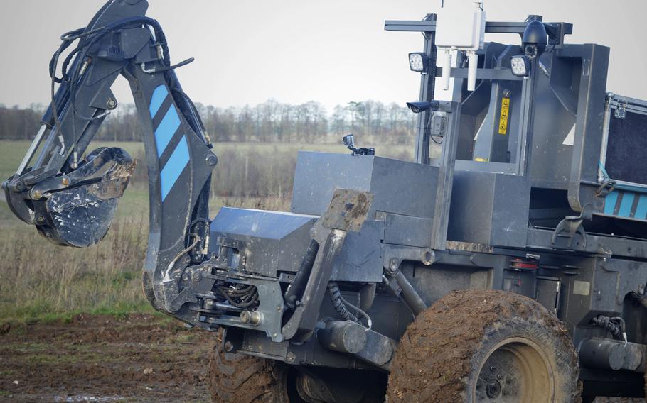 A Rakka 3000 multipurpose construction vehicle is remotely controlled with an array of onboard cameras during a demonstration for Exercise Autonomous Warrior on the Salisbury Plain Training Area, England, Monday, Dec. 10, 2018. The fourth annual Army Warfighting Experiment is a collaborative effort focused on using unmanned aerial and ground vehicles.