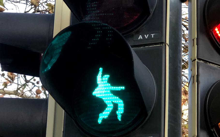 The King is still shaking his hips in Friedberg, Germany.  Elvis Presley was stationed at Ray Barracks in the late 1950s and the town has put up crosswalk lights in celebration of its connection to the most famous musician to ever don an Army uniform.