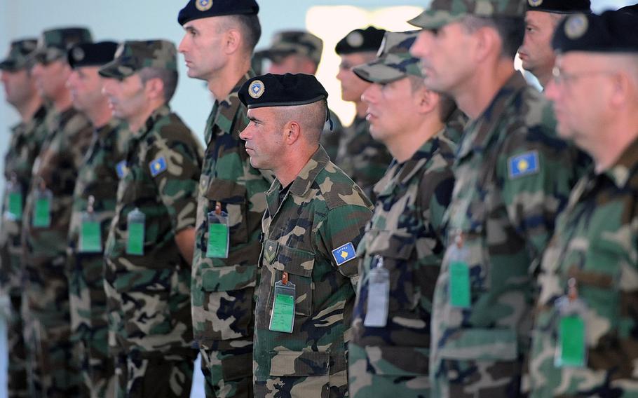Kosovo Security Force noncommissioned officers stand in formation at their senior NCO course graduation ceremony at a KSF base in Ferizaj, Kosovo. NATO will reconsider its support to it gives to Kosovo's security forces after the country's decision Friday to take a step toward forming an army.