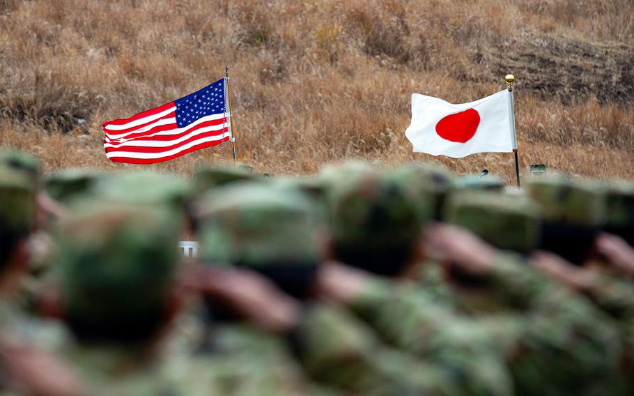 Marines with 2nd Battalion, 23rd Marine Regiment, currently assigned to 3rd Marine Division, join Japan Ground Self-Defense Force soldiers at the opening ceremony for exercise Forest Light 19.1 at Hijyudai Maneuver Area, Japan, Dec. 7, 2018.