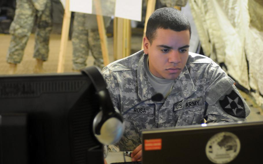 A soldier operates a computer during a past Key Resolve exercise at Camp Casey, South Korea.