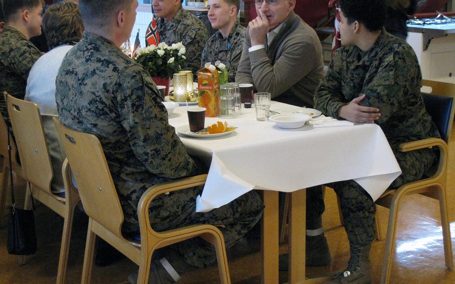 Undersecretary of the Navy Thomas Modly, second from right, eats lunch with Marines assigned to the Marine Rotational Force-Europe in Vaernes, Norway, Dec. 12, 2018. Modly was on a multination visit to Europe.