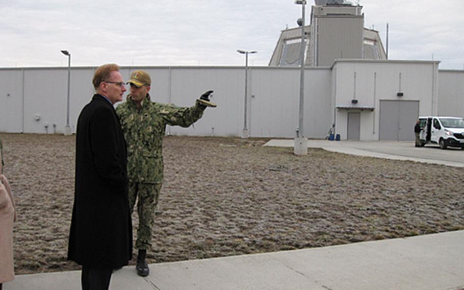 Cmdr. Axel Steiner, commanding officer of U.S. Aegis Ashore Missile Defense System, provides a tour to Undersecretary of the Navy Thomas Modly at Naval Support Facility Deveselu, Romania, Dec. 14, 2018. Modly was on a multination visit to the Europe.