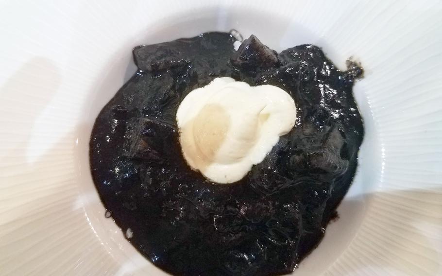 The cuttlefish stewed in its own ink at La Taperia de Columela, Cadiz, Spain.