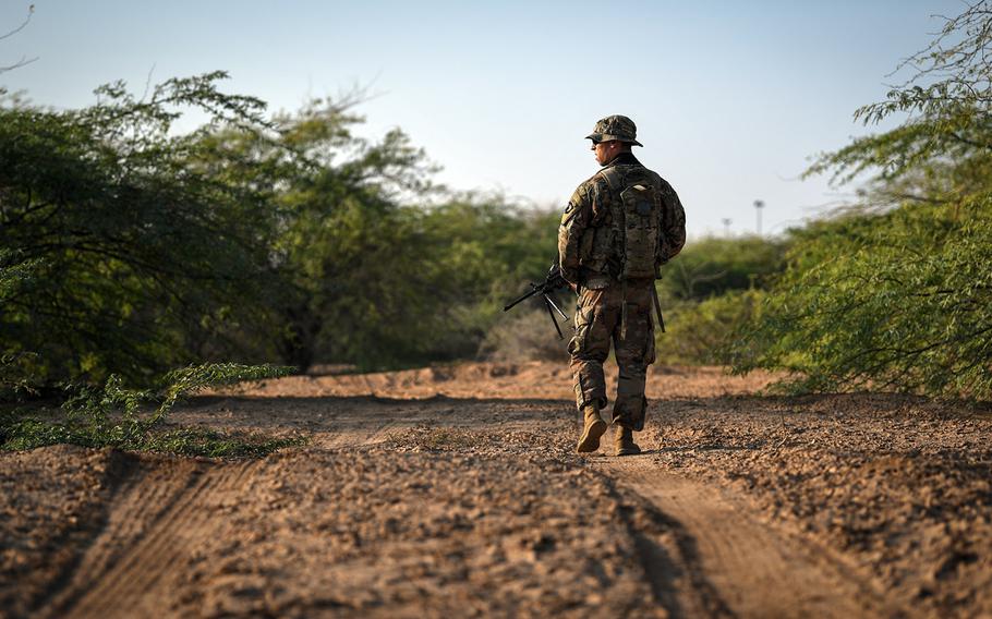 U.S. Army Spc. George Iliou assigned to Viper Company, 1-26 Infantry, 101st Airborne Division (Air Assault), with the East Africa Response Force, patrols during an exercise at Camp Lemonnier, Djibouti, Dec. 13, 2018.