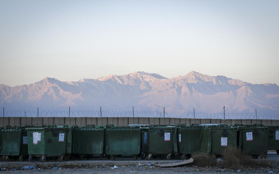 Trash at Camp Dahlke West in Afghanistan is brought off the base into local landfills. Workers on base sort through the trash to pick out any classified information or security risks.