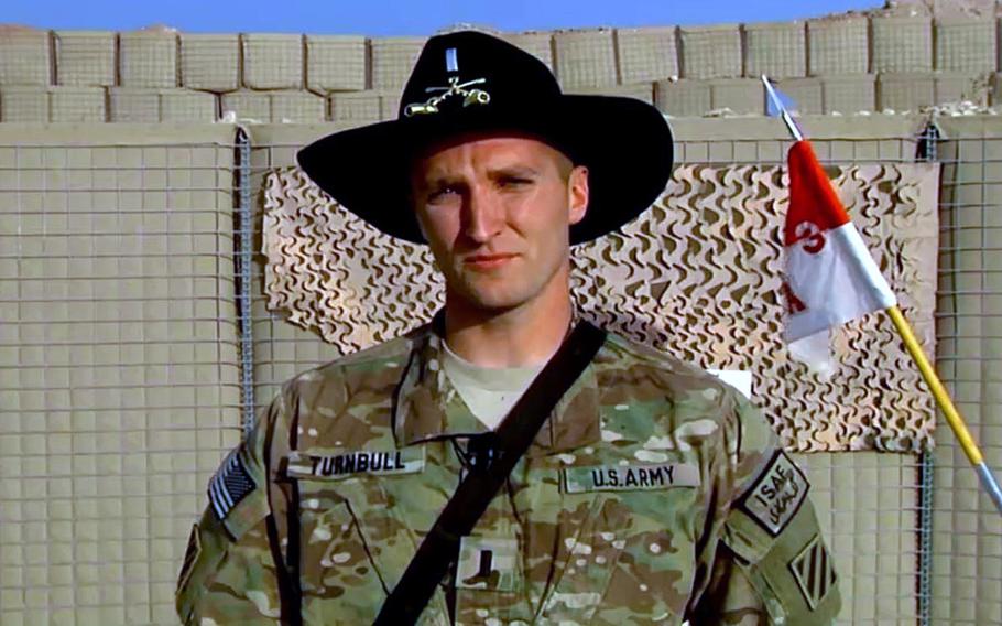Capt. Jonathan Turnbull of Gaylord, Mich., is pictured here as a first lieutenant deployed with Apache Troop, 3rd Squadron, 7th United States Cavalry to Combat Outpost Shir Khan, Afghanistan, in a screenshot of a December 2012 holiday greetings video. Turnbull was badly wounded in a bombing in Manbij, Syria, on Wednesday, Jan. 16, and was said to be in serious condition at Landstuhl Regional Medical Center in Germany on Monday, Jan. 22, 2019.