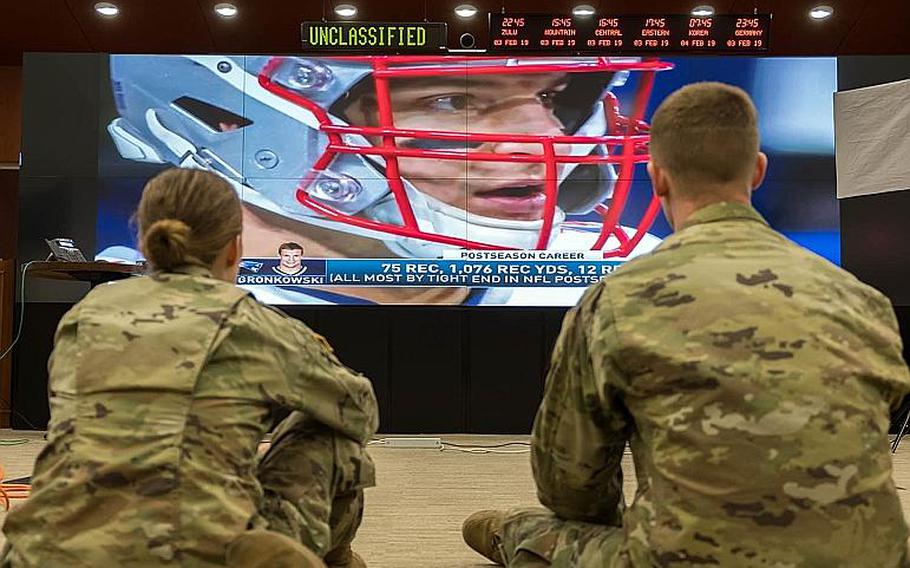 Soldiers assigned to the 2nd Infantry Division watch the Super Bowl LIII pre-game show in the 2nd ID War Room at Camp Humphreys, South Korea, Monday, Feb. 4, 2019.