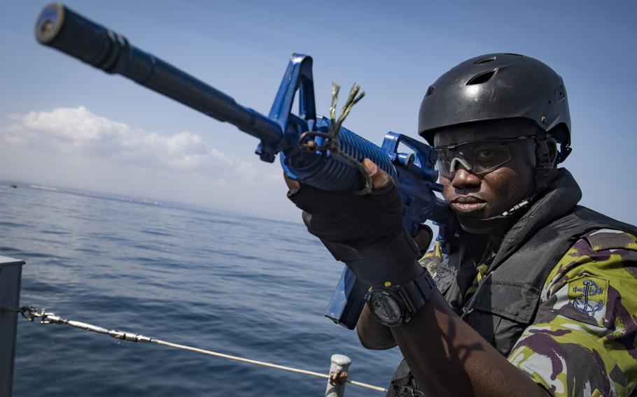 A Kenyan sailor participates in visit, board, search and seizure training aboard the Indian frigate INS Trikand during exercise Cutlass Express 2019 in Djibouti, Feb. 3, 2019.