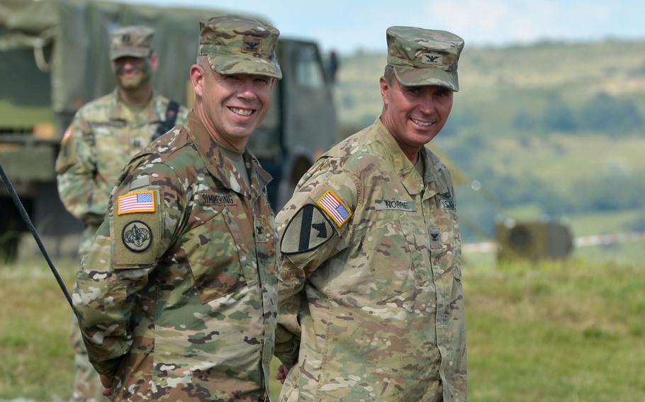 Then-Col. Christopher Norrie, right, and Col. Michael Simmering during a ceremony at the Center for Joint National Training in Cincu, Romania, in 2017. Norrie will lead the 7th Army Training Command in Grafenwoehr, Germany.