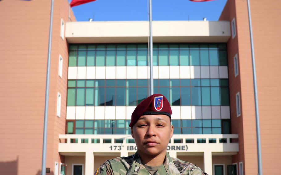 Former drill sergeant Master Sgt. Rosemery Tejada, a first sergeant for the 173rd Airborne HHC Brigade, poses in front of brigade headquarters. 