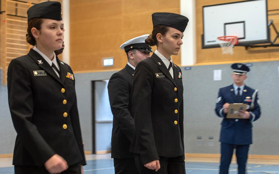 Members of the Naples drill team participate in the unarmed regulation competition during the DODEA-Europe JROTC drill team championships at Ramstein, Germany, Saturday, March 2, 2019. More than 100 cadets from 11 JROTC drill teams participated in the competition.