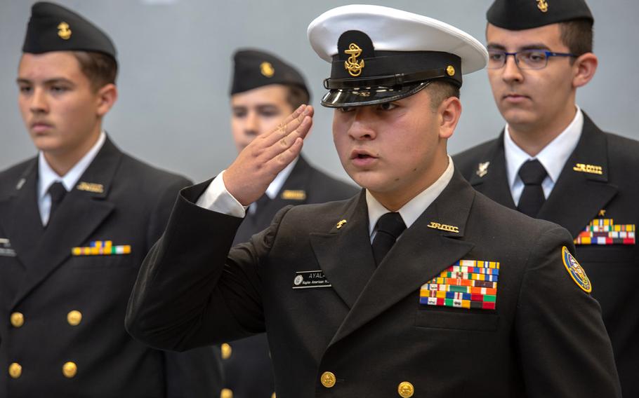 Members of the Naples drill team participate in the unarmed regulation competition during the DODEA-Europe JROTC drill team championships at Ramstein, Germany, Saturday, March 2, 2019. More than 100 cadets from 11 JROTC drill teams participated in the competition.