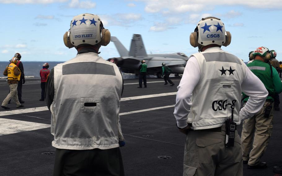 U.S. Second Fleet commander Vice Adm. Andrew Lewis, left, and Rear Adm. Gene Black, commander of  Carrier Strike Group Eight, observe flight operations aboard USS Harry. S Truman in the Atlantic Ocean in September 2018. The U.S. 2nd Fleet will lead the 47th annual exercise Baltic Operations this year.