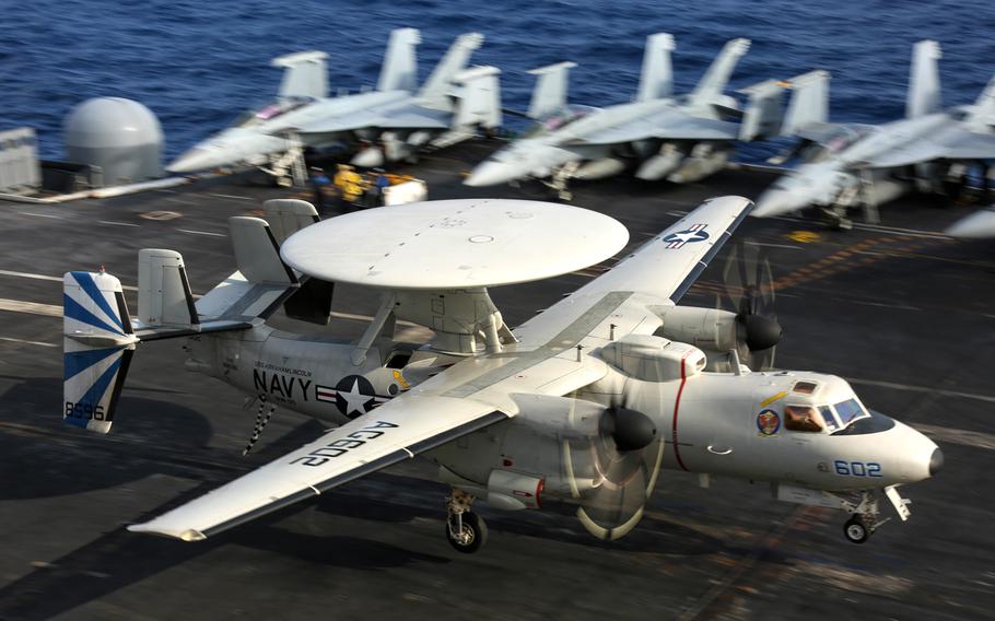 An E-2D Hawkeye performs an arrested landing on the flight deck of the aircraft carrier USS Abraham Lincoln in February 2019 in the Atlantic Ocean. The Navy awarded Northrop Grumman a $3.2-billion five-year contract modification to buy 24 E-2D Advanced Hawkeye airborne surveillance aircraft.