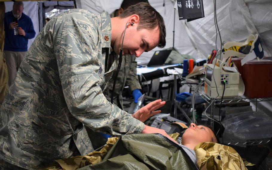 Maj. Jason Edwards, internal medicine specialist, 86th Medical Group, Ramstein Air Base, Germany, participates in a multinational medical exercise drill during Vigorous Warrior 19, Cincu Military Base, Romania, April 8, 2019.
