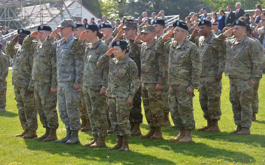 Servicemembers of the U.S. European Command salute during the change of command ceremony in Stuttgart, Germany, Thursday, May 2, 2019.