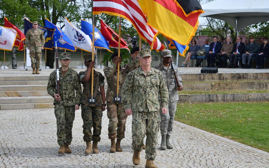 The U.S. European Command color guard marches off at the conclusion of the change of command ceremony at Patch Barracks in Stuttgart, Germany, Thursday, May 2, 2019. Watching the proceedings at left in the background is the new EUCOM commander Air Force Gen. Tod D. Wolters who took command from U.S. Army Gen. Curtis M. Scaparrotti.