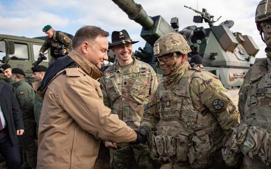 Polish president Andrzej Duda meets with soldiers assigned to the Tennessee Army National Guard?s 2nd Squadron, 278th Armored Cavalry Regiment's Task Force Raider, during a visit to Bemowo Piskie Training Area, Poland, March 6, 2019. The U.S. and Poland are negotiating an agreement that could mean stationing more American forces in the country.