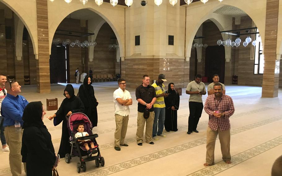 A guide answers questions for servicemembers at the Al-Fateh Mosque in Bahrain during a base indoctrination tour in August 2018.  Ramadan, the Muslim holy month, is set to begin May 6 and requires all expats in Bahrain to observe fasting laws during daylight hours.